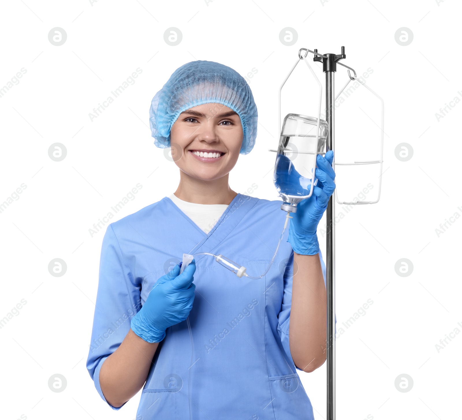 Photo of Nurse setting up IV drip on white background