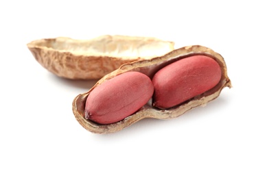 Photo of Raw peanuts in pod on white background