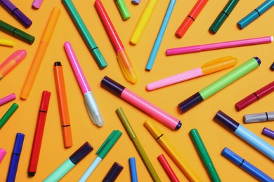 Photo of Different school stationery on yellow background, flat lay