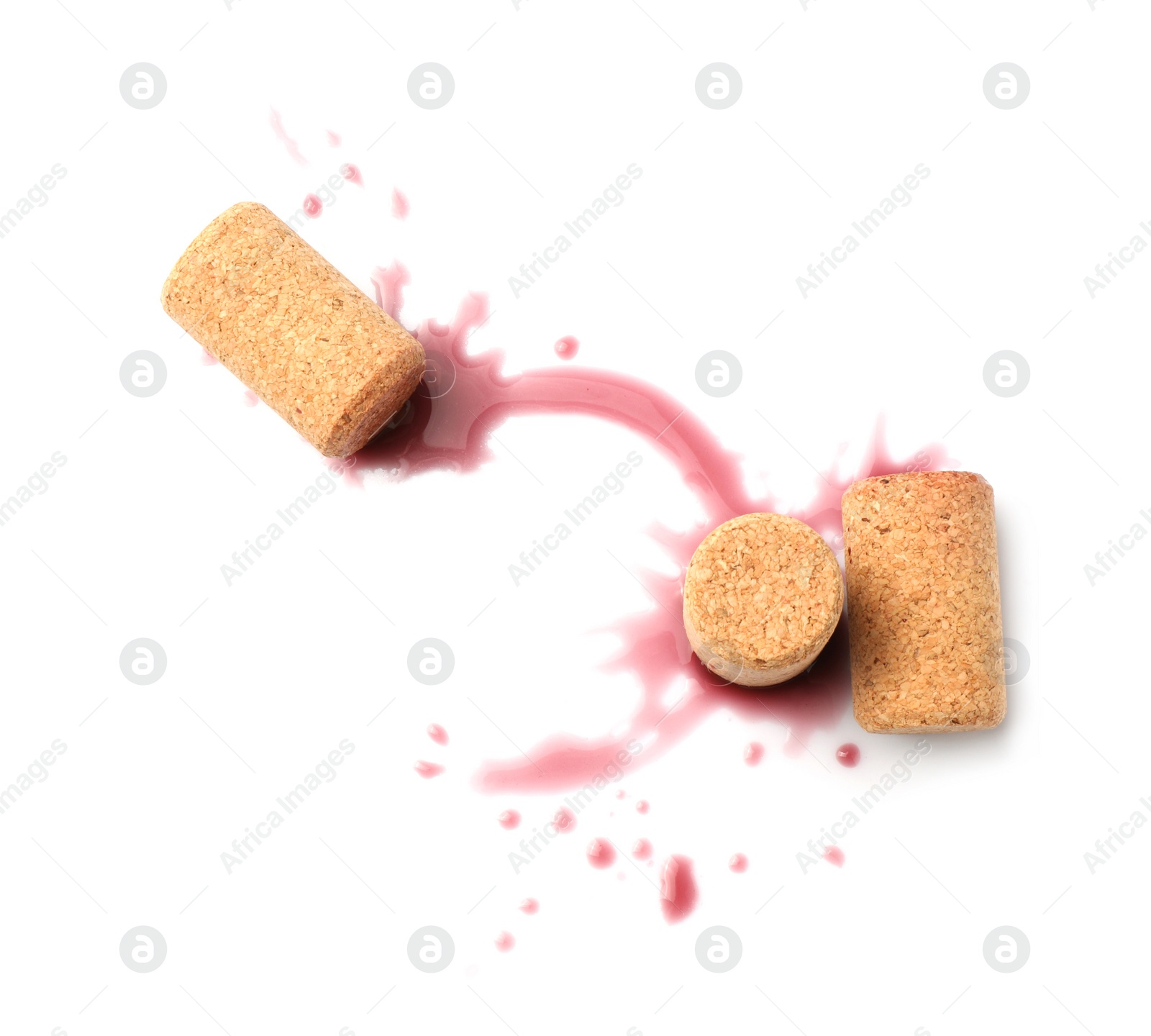 Photo of Bottle corks with wine stains on white background, top view