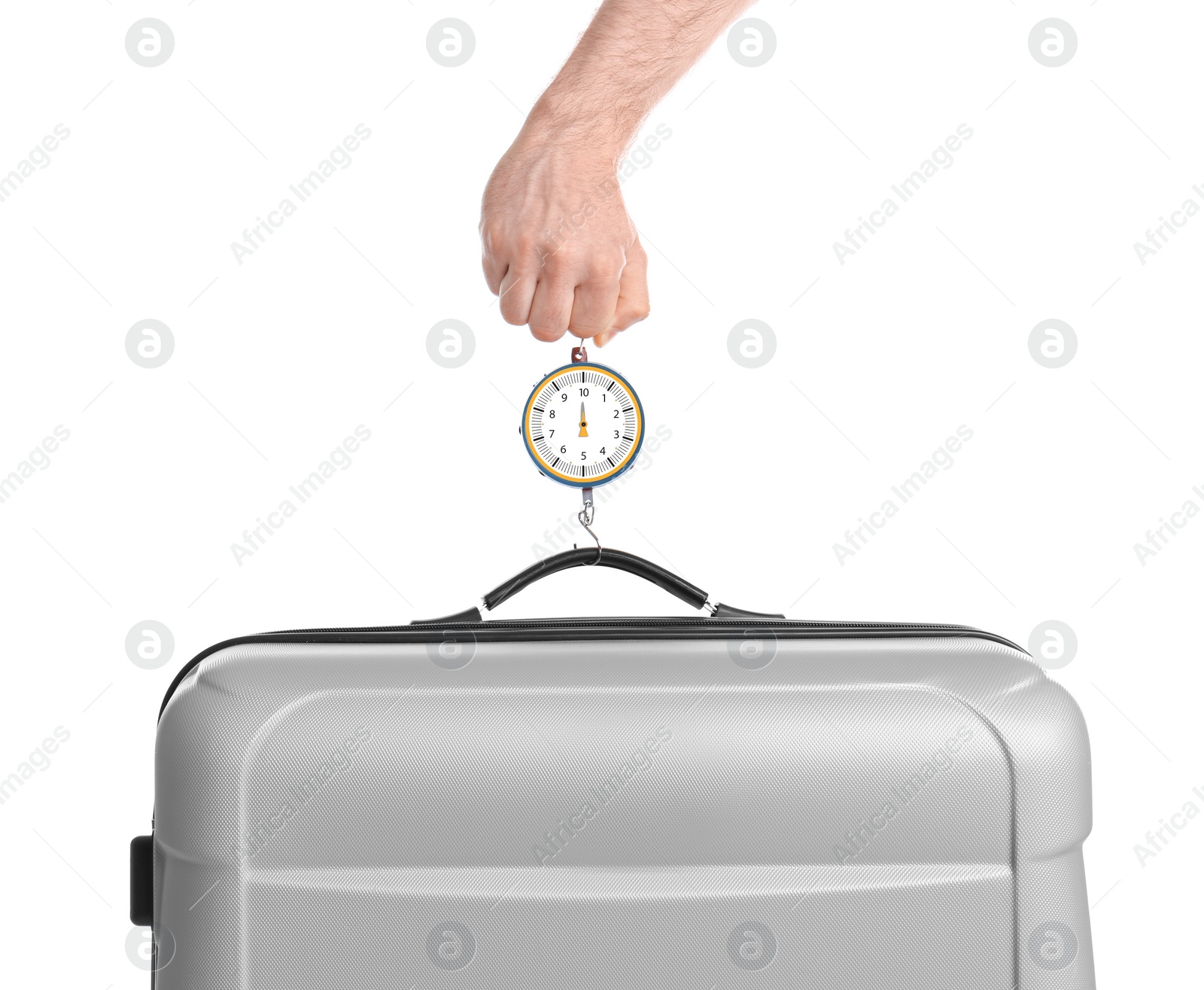 Photo of Man weighing stylish suitcase against white background, closeup