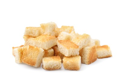 Photo of Pile of delicious crispy croutons on white background