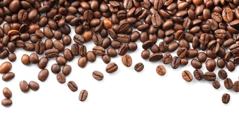 Many roasted coffee beans isolated on white , top view