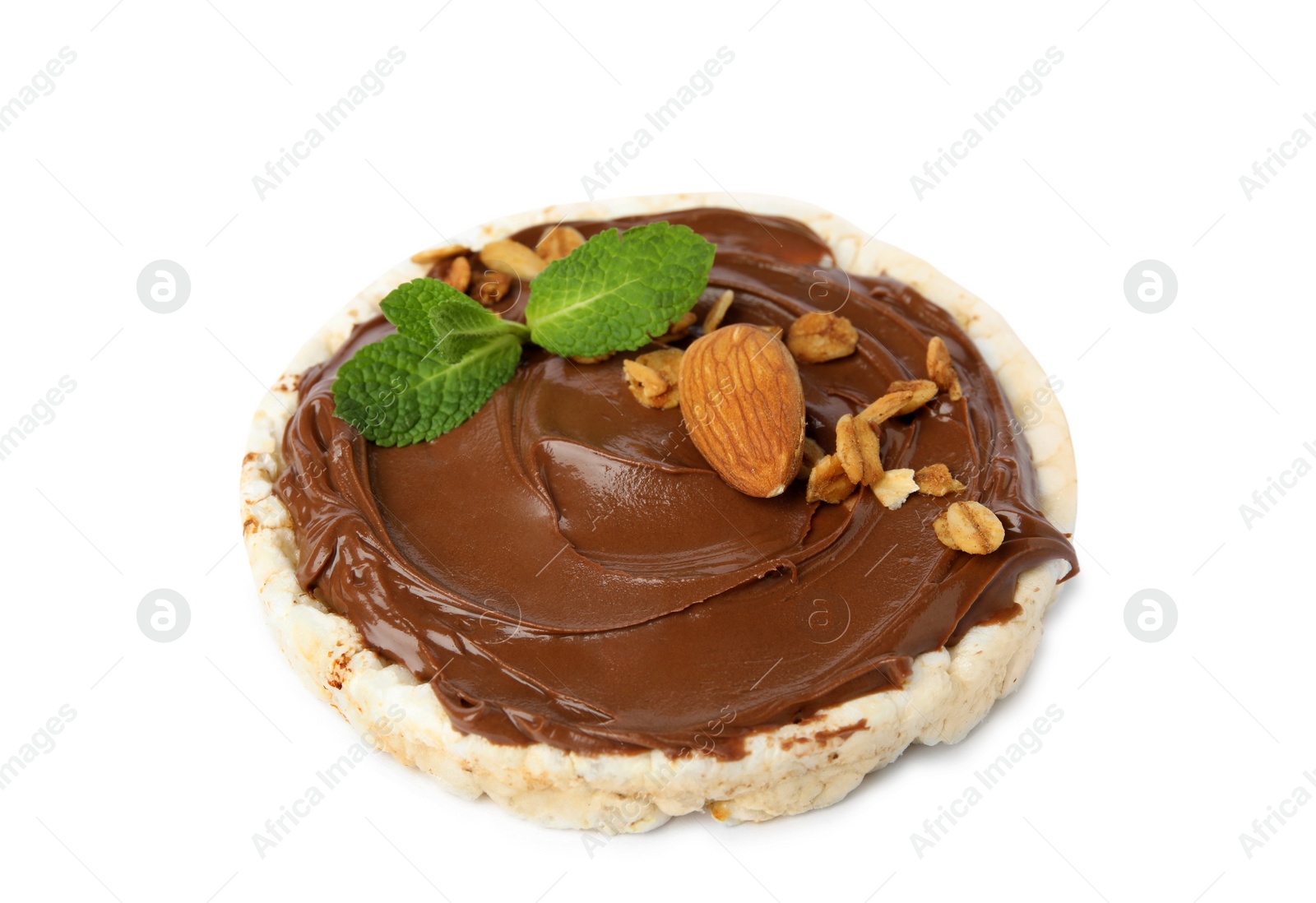 Photo of Puffed rice cake with chocolate spread, nuts and mint isolated on white