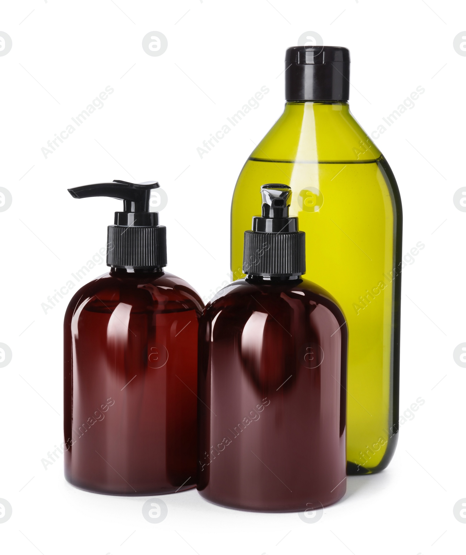 Photo of Different bottles of shampoo on white background