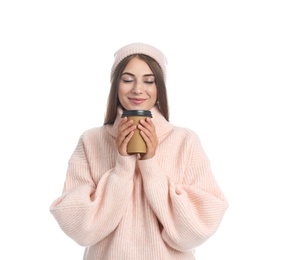 Photo of Happy beautiful woman with paper cup of mulled wine on white background