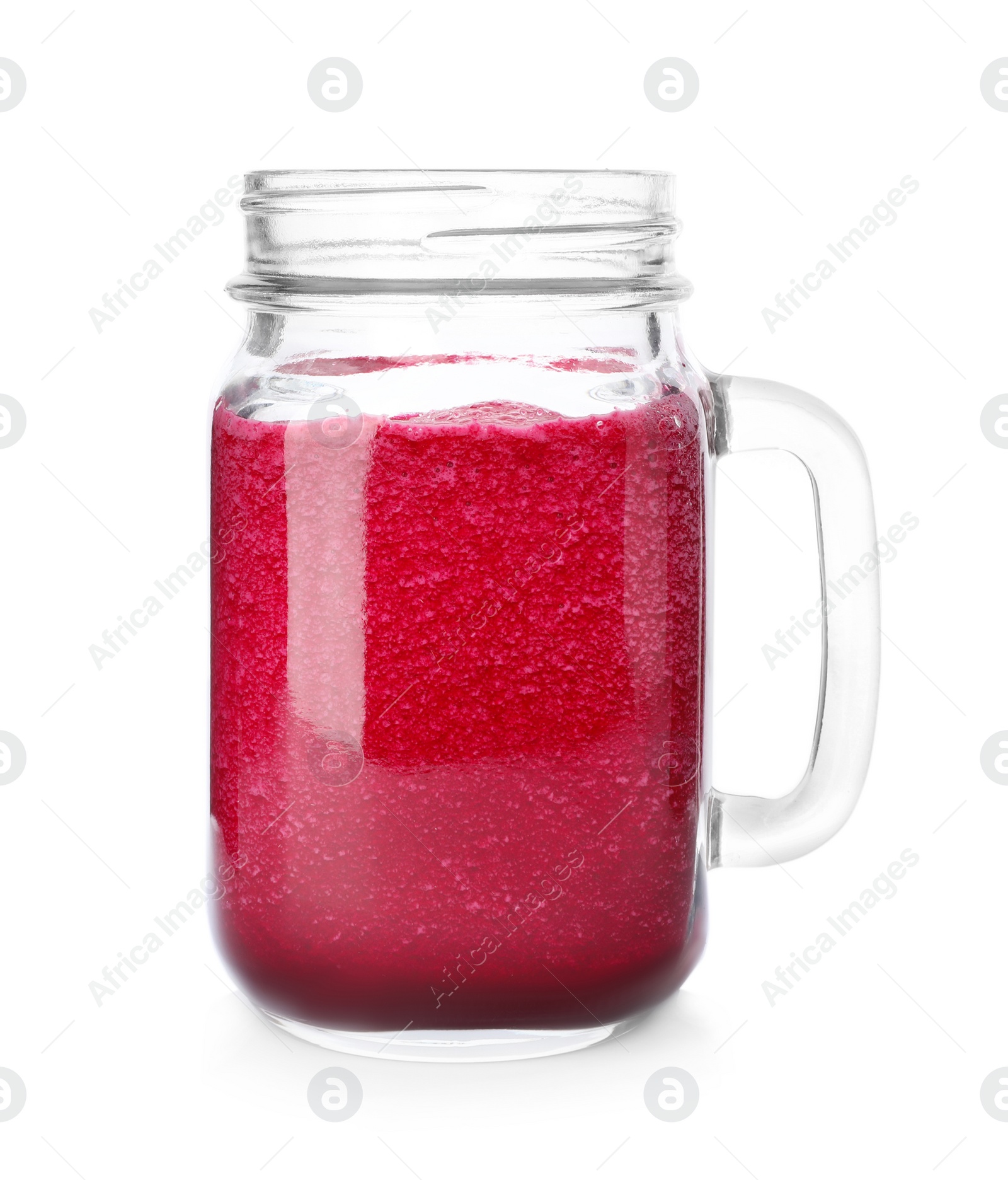 Photo of Mason jar with fresh beet juice on white background