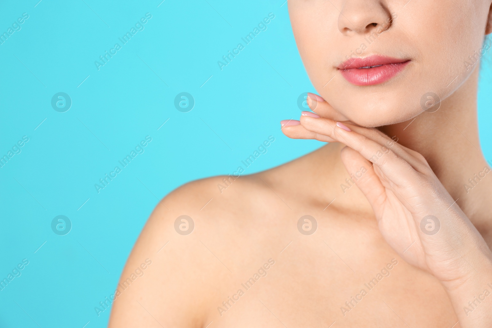 Photo of Closeup view of beautiful young woman and space for text on color background. Cosmetic surgery concept