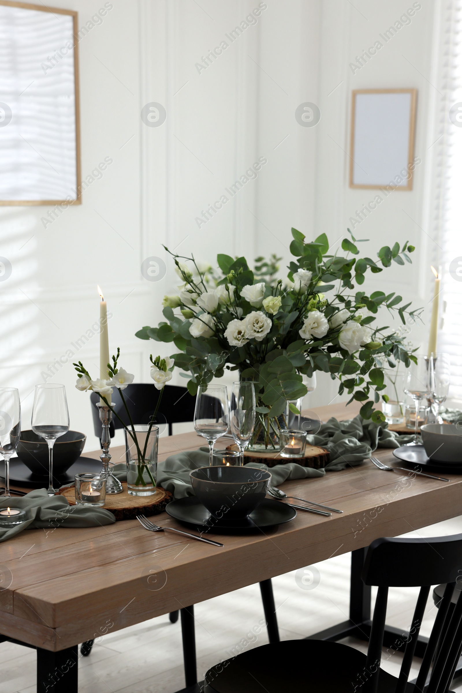 Photo of Festive table setting with beautiful tableware and decor indoors