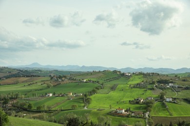 Beautiful view of countryside landscape under cloudy sky