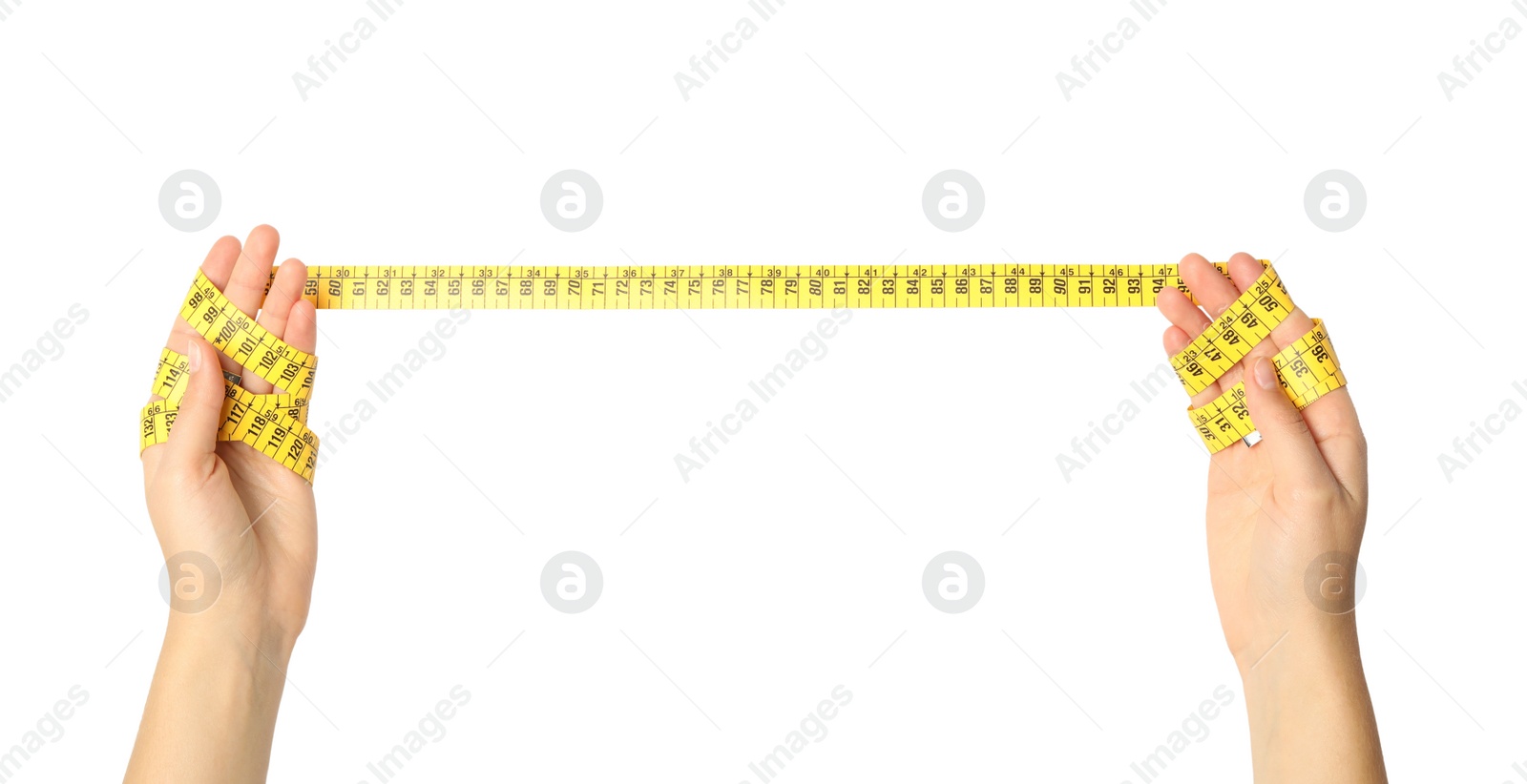 Photo of Woman holding yellow measuring tape on white background, closeup