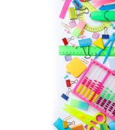 Composition with different school stationery on white background