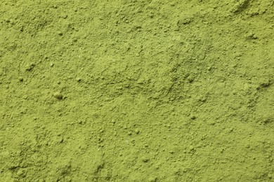 Photo of Powdered matcha green tea as background, top view