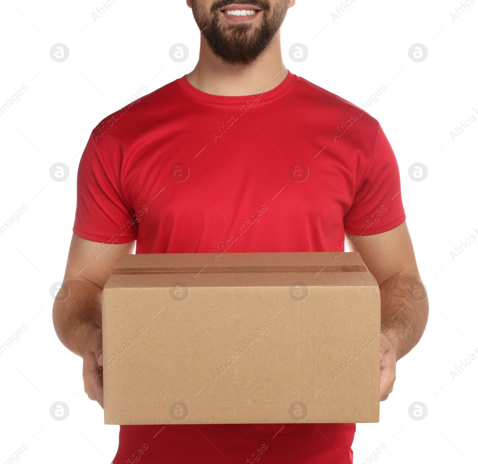 Photo of Courier holding cardboard box on white background, closeup