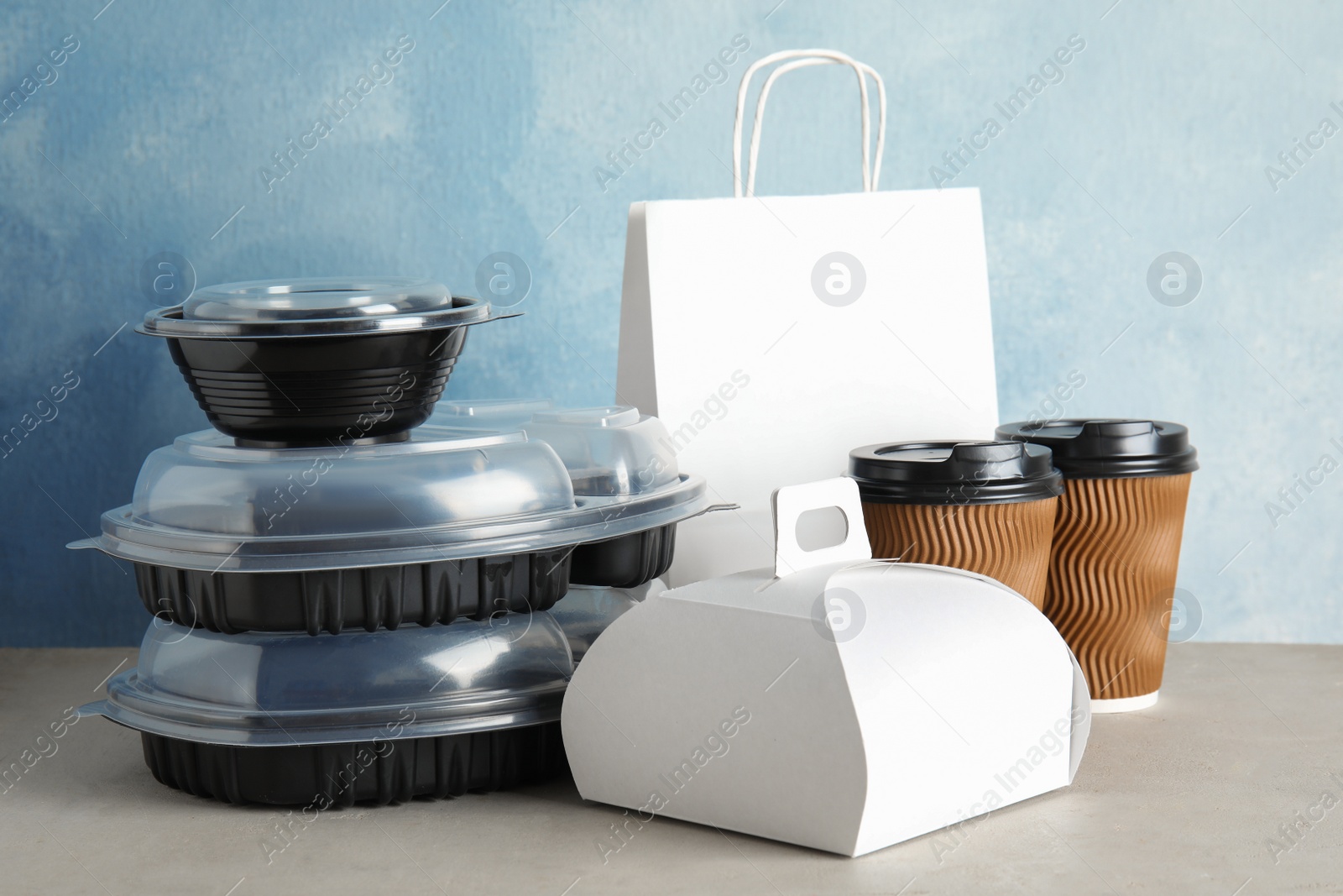 Photo of Various takeout containers on table. Food delivery service