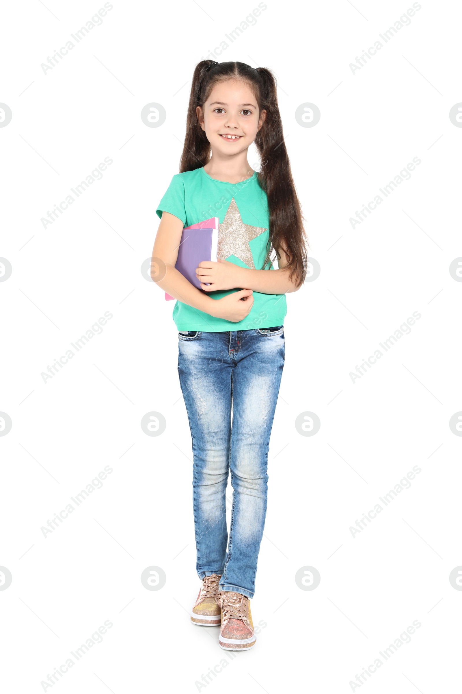 Photo of Little child with school supplies on white background