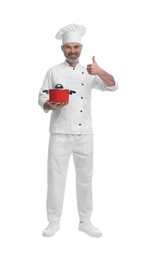 Photo of Happy chef in uniform with cooking pot showing thumbs up on white background