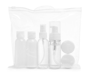 Photo of Cosmetic travel kit in plastic bag isolated on white. Bath accessories