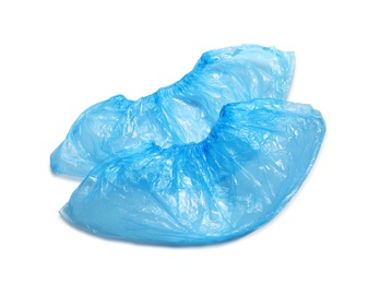 Photo of Medical blue shoe covers on white background