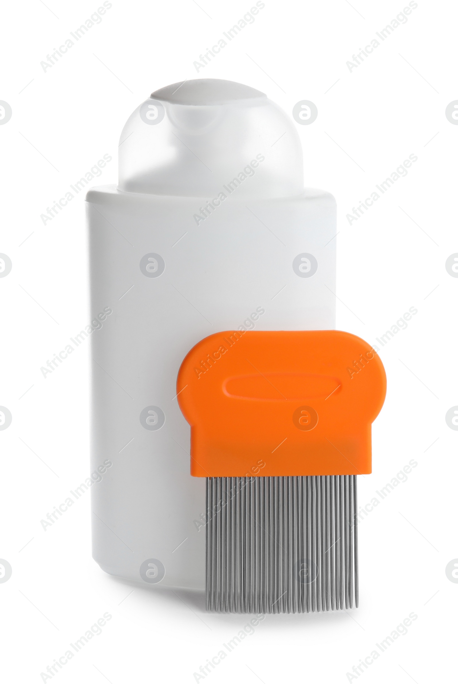 Photo of Shampoo and metal comb for anti lice treatment on white background