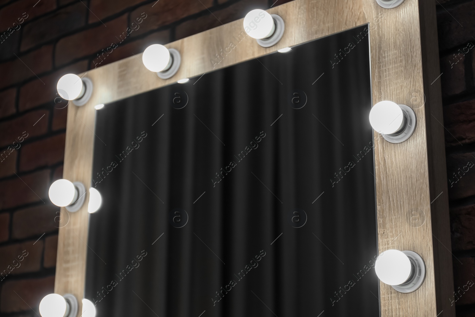 Photo of Mirror with light bulbs in makeup room