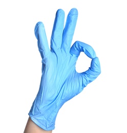 Photo of Doctor in medical glove showing OK gesture on white background