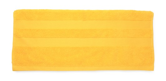 Photo of Soft yellow terry towel isolated on white, top view