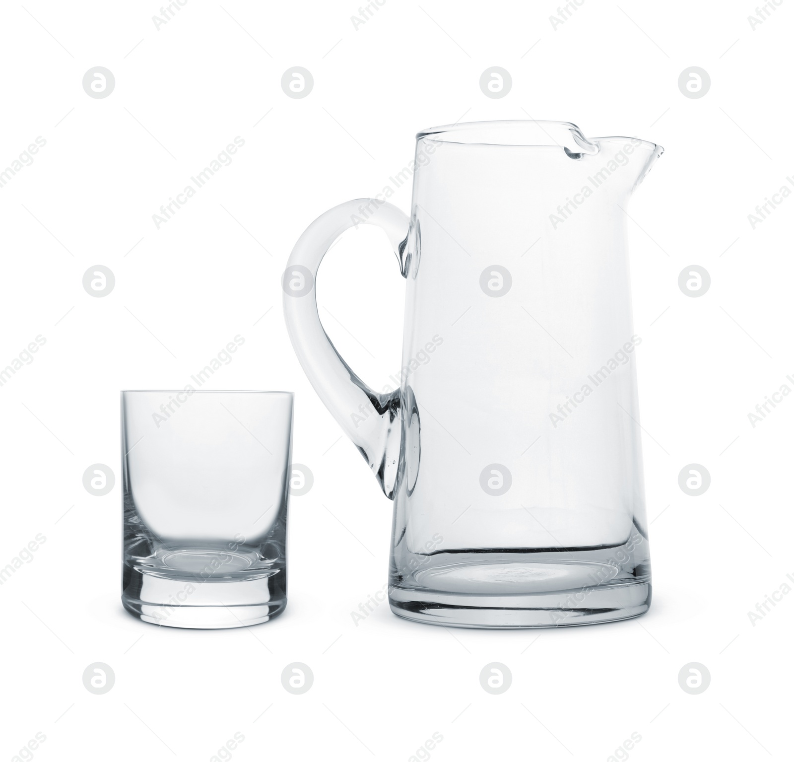 Image of Empty glass and jug isolated on white