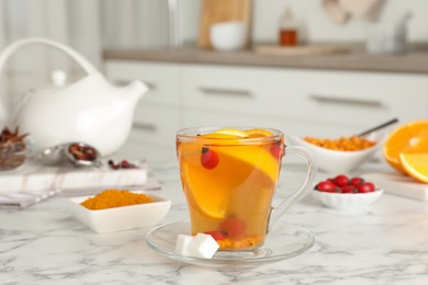 Immunity boosting drink on white marble table indoors