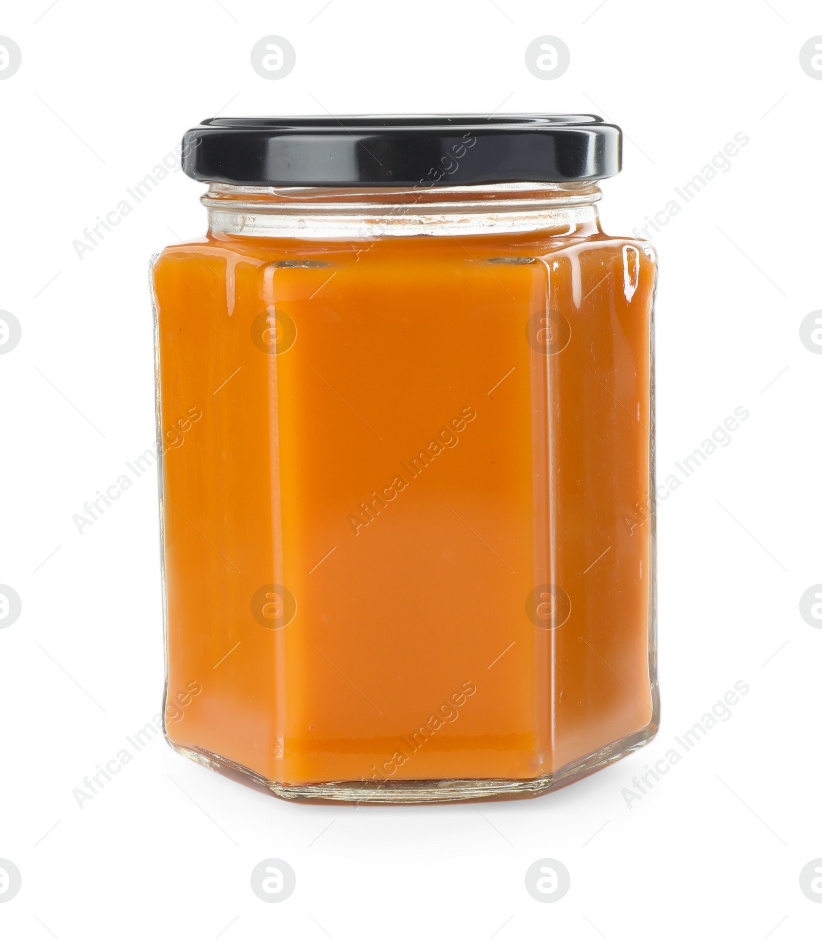 Photo of Delicious persimmon jam in jar isolated on white