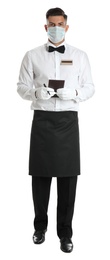 Photo of Waiter in medical mask with notepad on white background