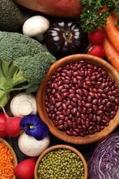 Photo of Different vegetables on table, flat lay. Vegan diet