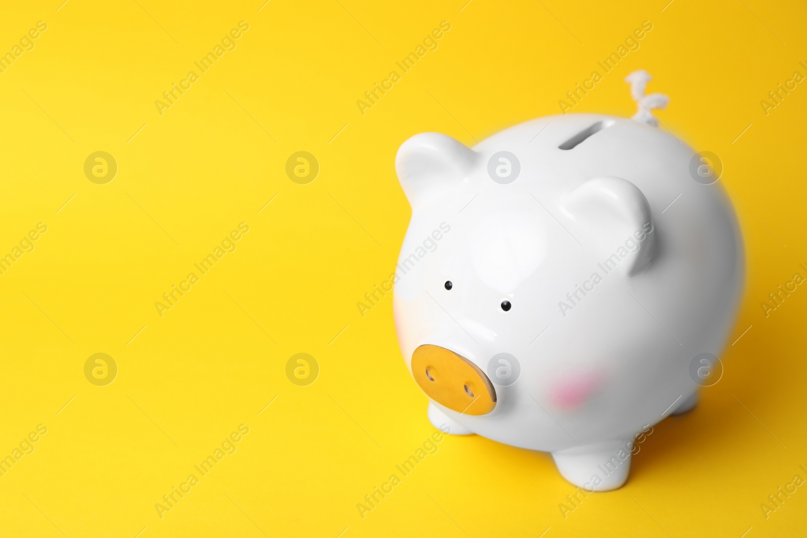 Photo of White piggy bank on color background. Money saving