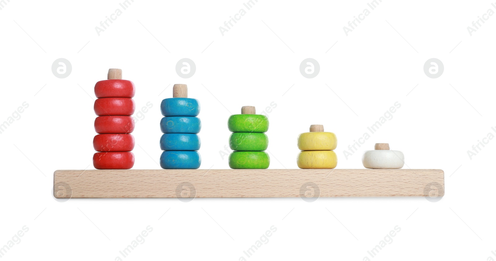 Photo of Stacking and counting game wooden pieces isolated on white. Educational toy for motor skills development