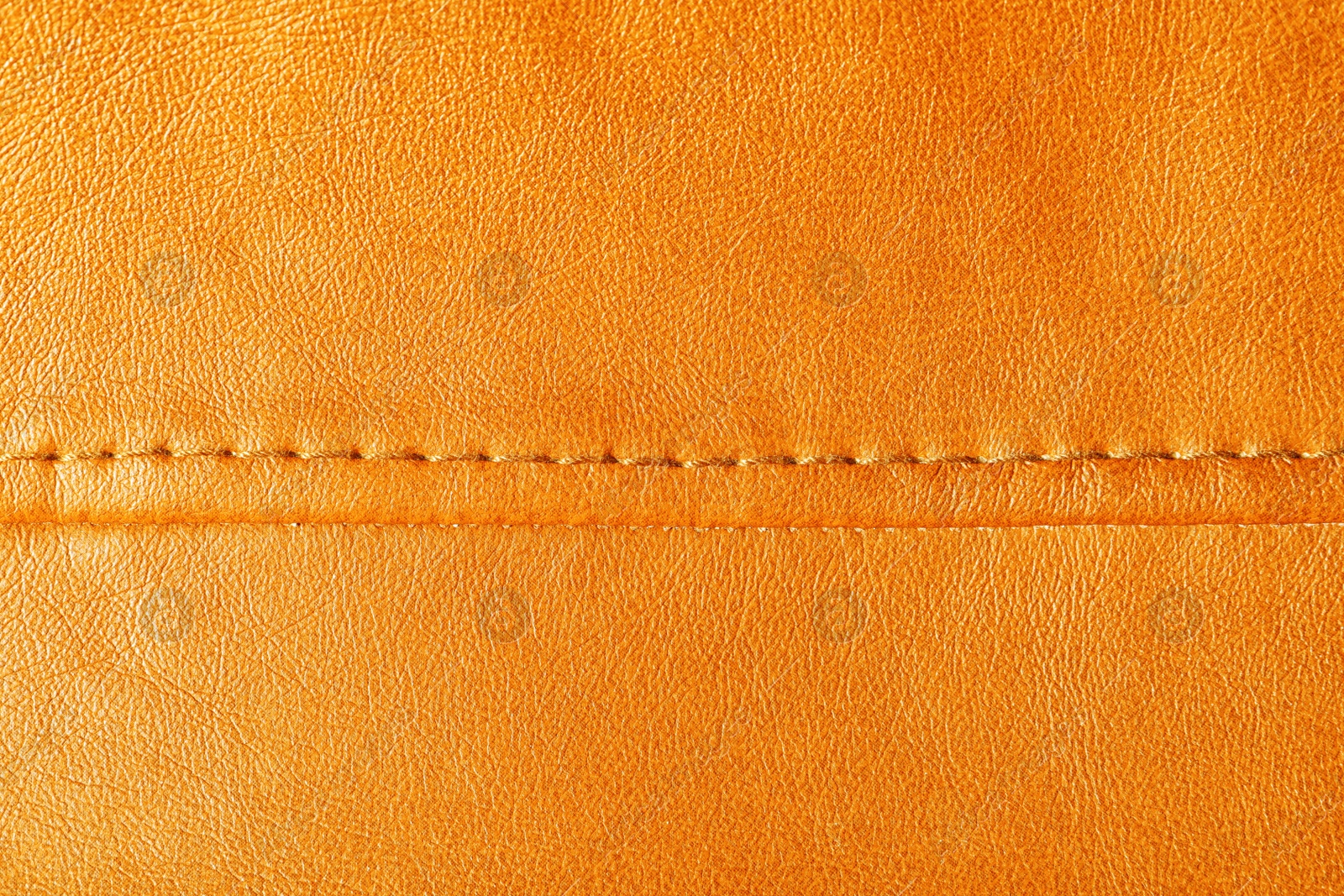 Image of Texture of orange leather as background, closeup 