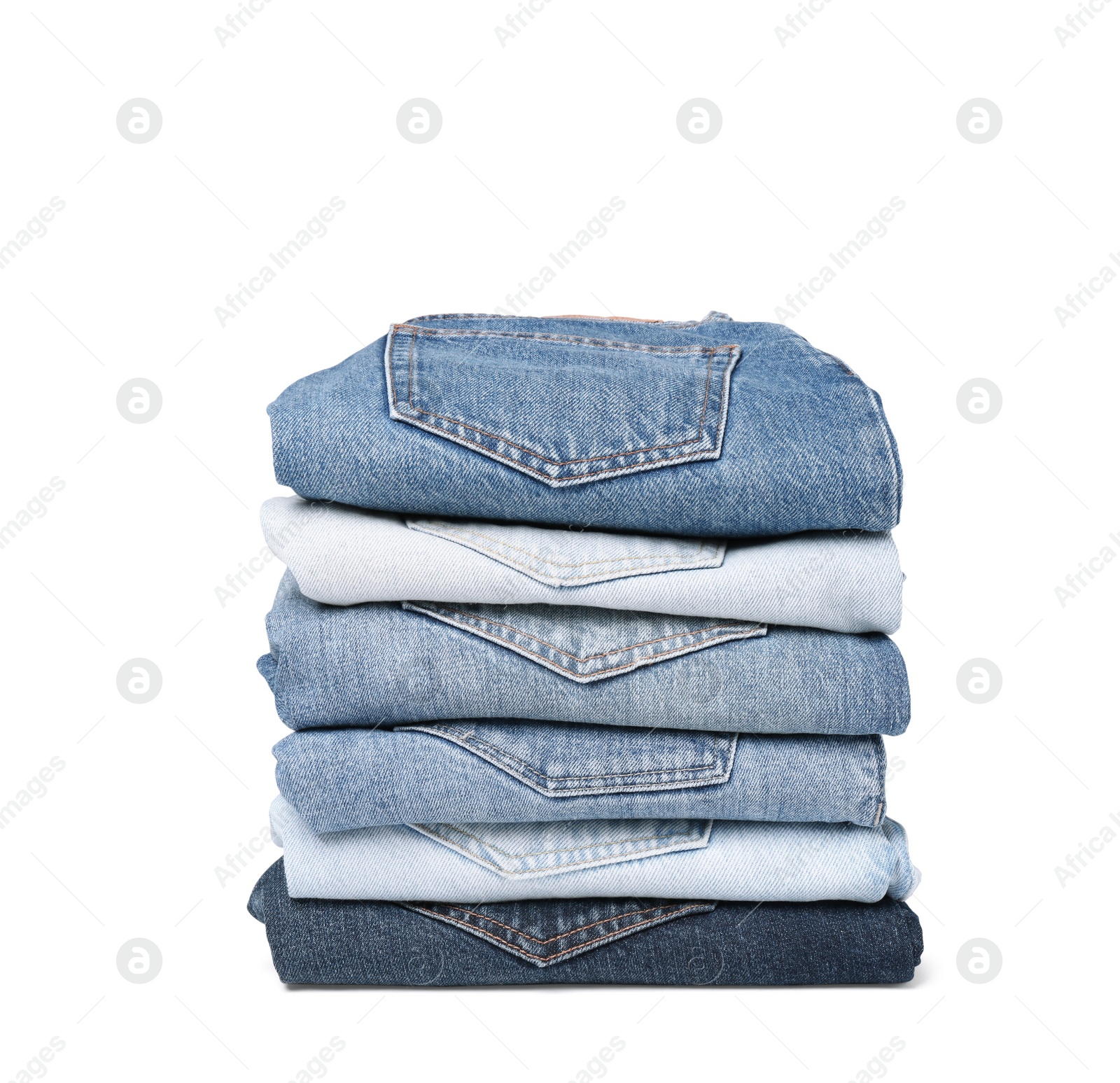 Image of Stack of different folded jeans isolated on white