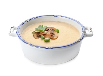 Bowl of fresh homemade mushroom soup on white background