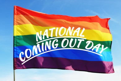 Image of National Coming Out day. Rainbow pride flag with text against sky
