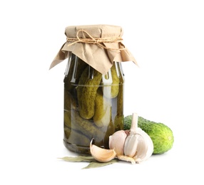 Photo of Jar with pickled cucumbers on white background