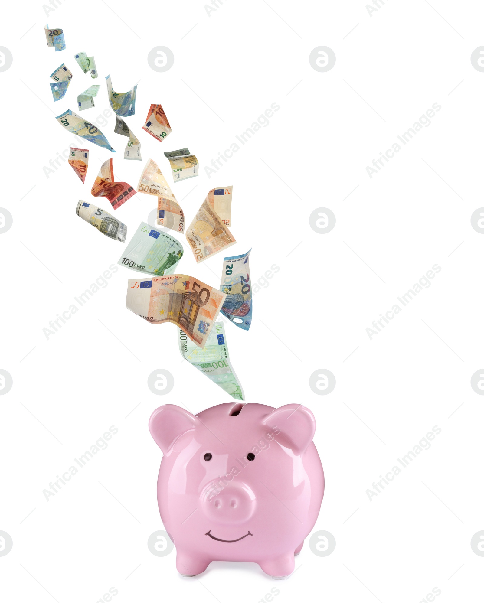 Image of Euro banknotes falling into pink piggy bank on white background