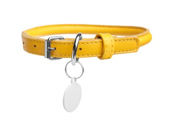 Photo of Yellow leather dog collar with tag isolated on white