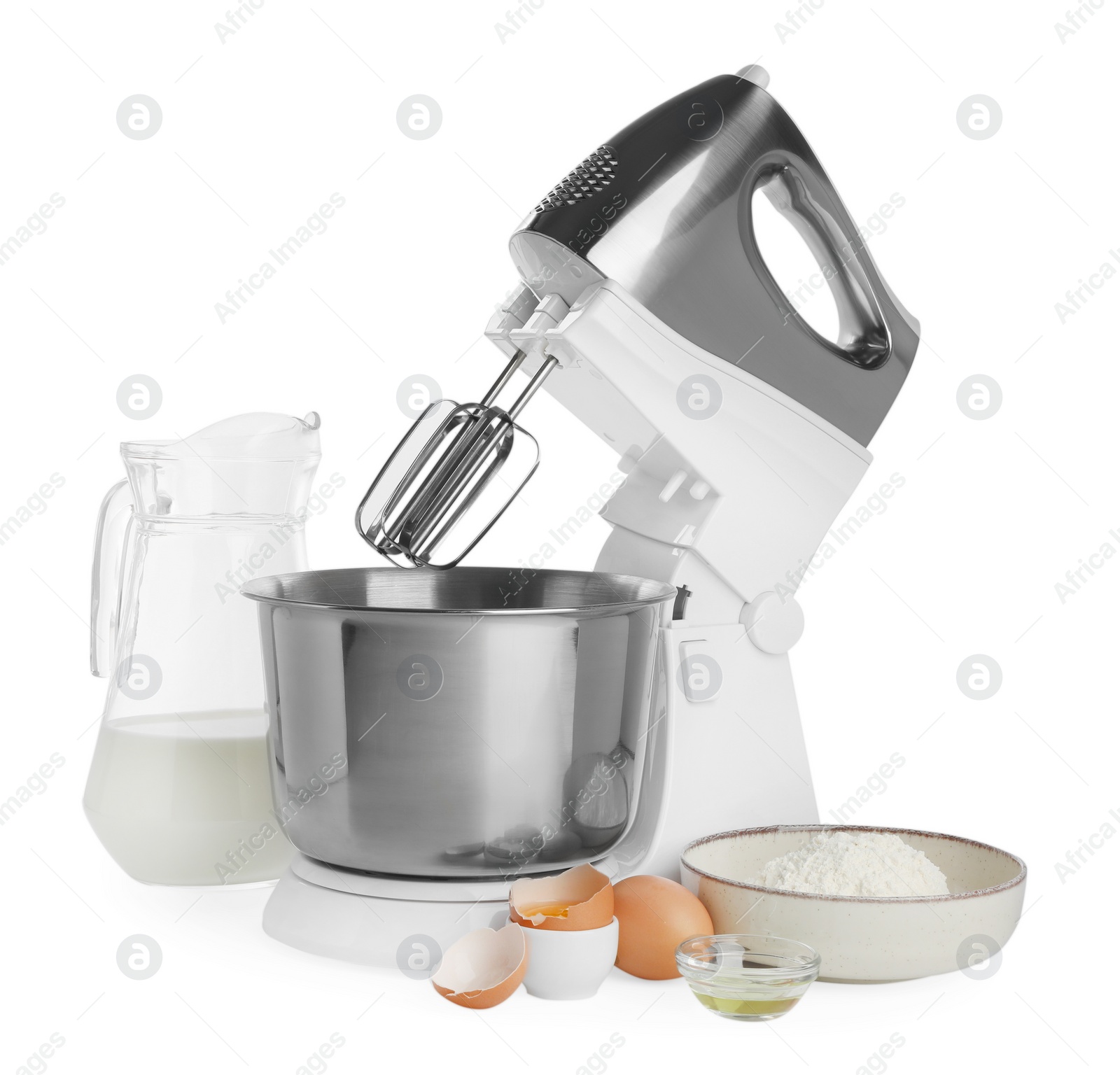 Photo of Stand mixer and different ingredients for dough isolated on white