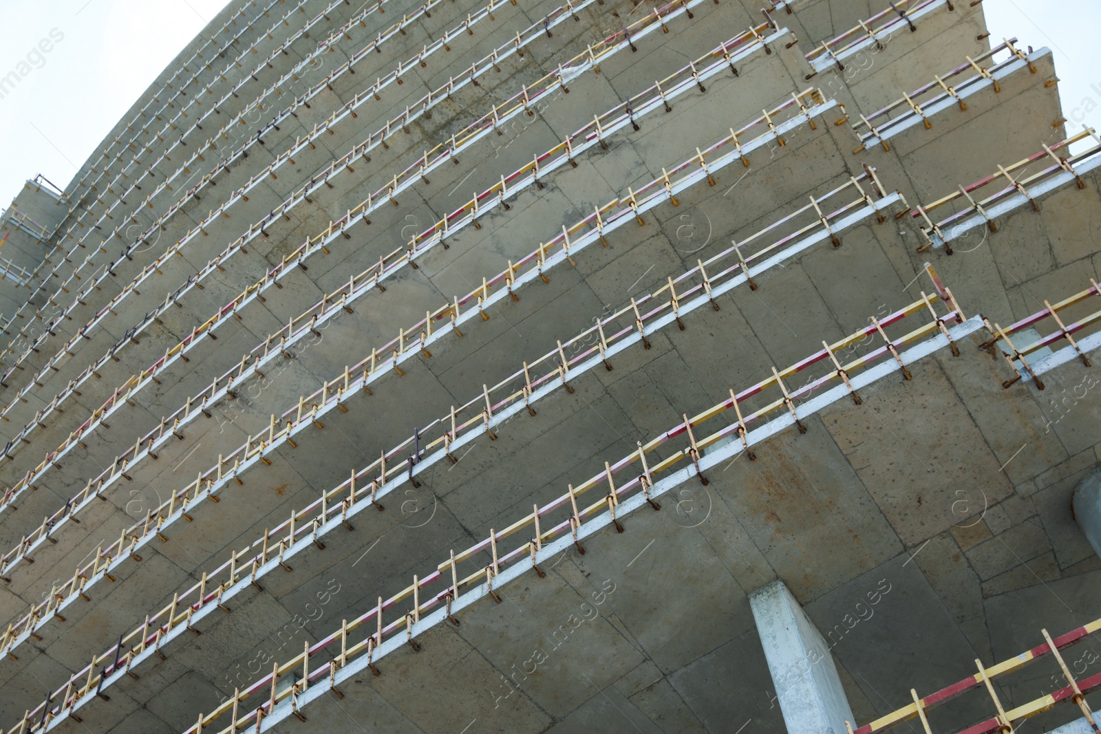 Photo of Construction site with unfinished building, low angle view