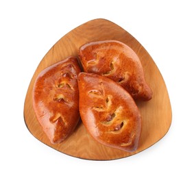 Photo of Wooden board with delicious baked patties on white background, top view