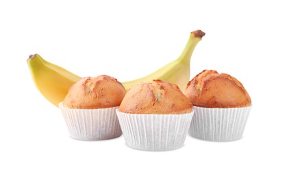 Photo of Tasty muffins and ripe banana on white background