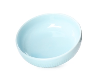 Photo of Clean light blue bowl isolated on white