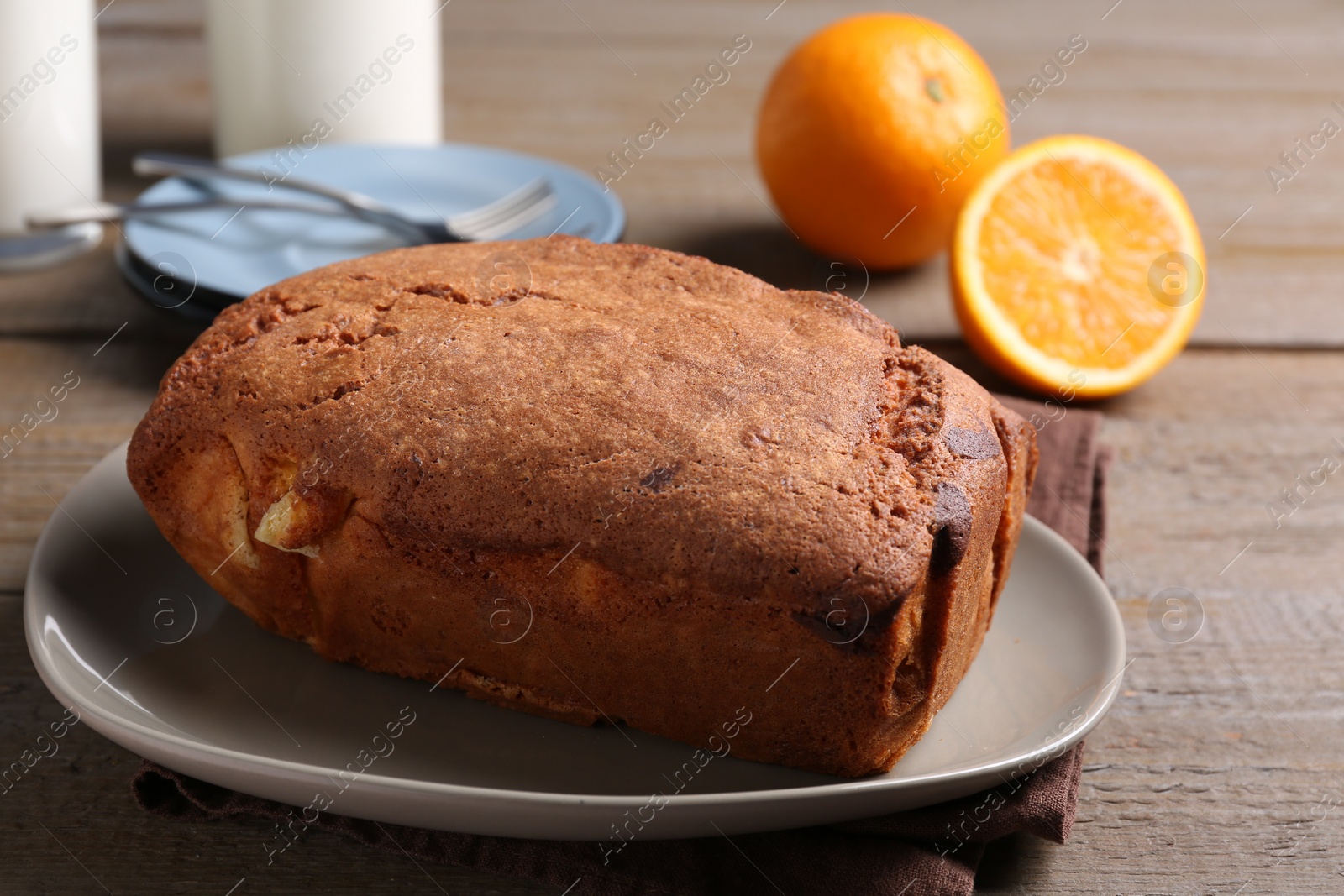 Photo of Fresh delicious cake served on wooden table, closeup