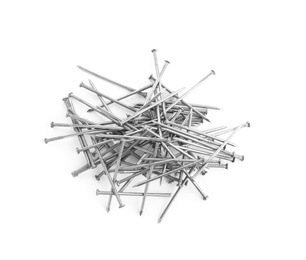 Photo of Pile of metal nails on white background, top view