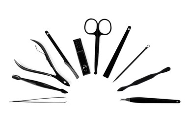 Manicure set on white background, top view