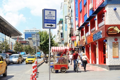 Photo of ISTANBUL, TURKEY - AUGUST 07, 2018: Busy city street with stores on sunny day